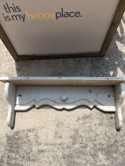 Antique wooden shabby chic shelf with porcelain knob