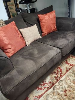 Couch and love seat smoking free pet free in good condition no stains selling both for 100