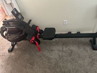 Water rowing machine