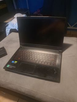 black MSI GF63 Thin gaming laptop (No Charger)