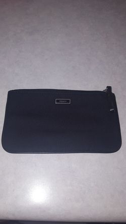 Coach mini make up bag.