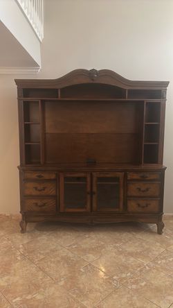 Dark brown entertainment center used