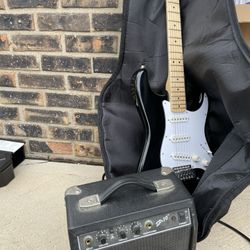 Electric Fender Guitar And Amplifier 