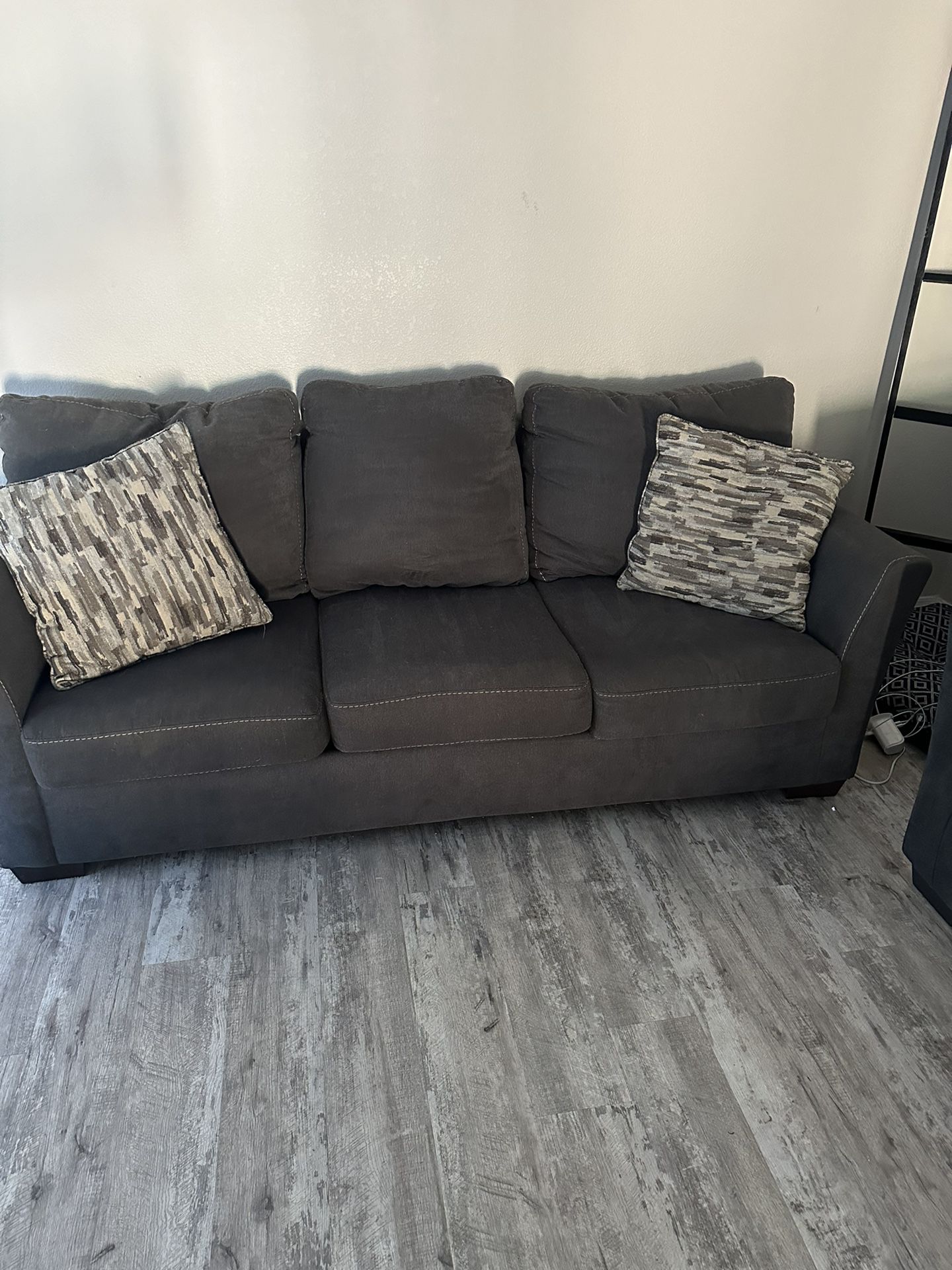 Grey couch with pull out bed and love seat 