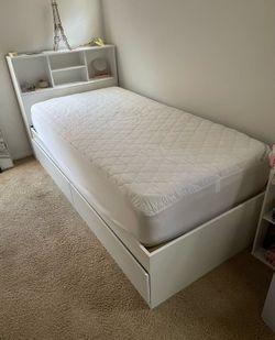 Twin bed with mattress