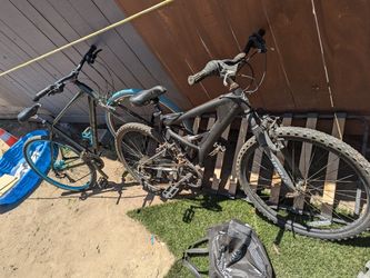 2 Mountain Bikes One 27" And Other 29"