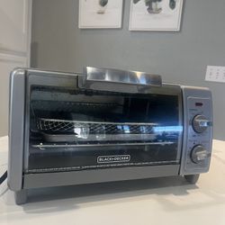 Oven Toaster Works Great.    Very Clean 