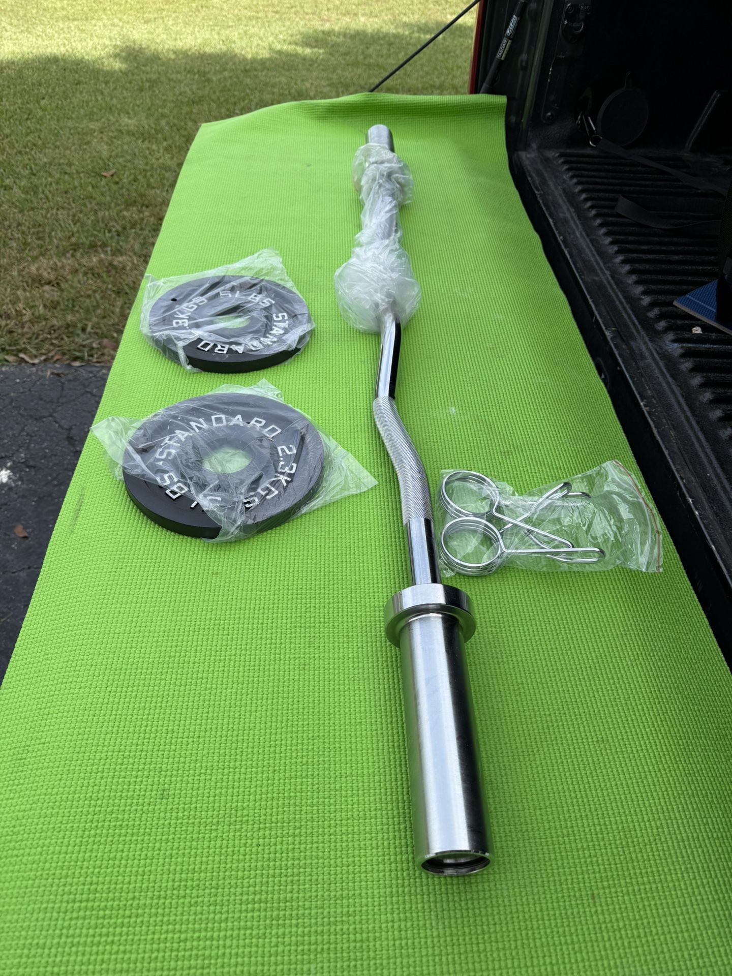 Olympic Curl Bar 4’, Spring Type Collars, And Weights- All New Items