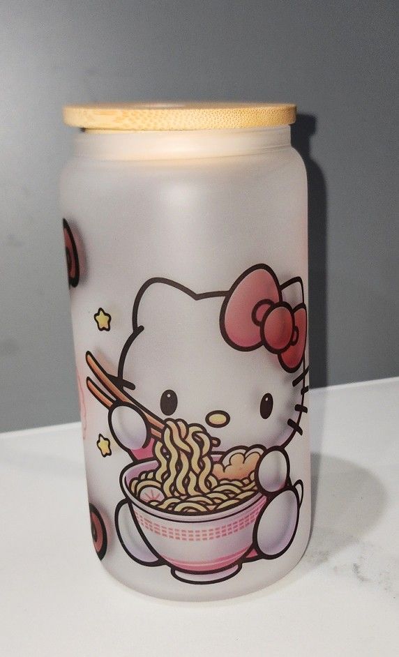Hello Kitty 20 OZ. Frosted Glass with Bamboo Lid Comes with Re-useable Straw and 2 Hello Kitty Silicone Straw Covers