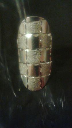 925 silver ring size 7 1/2 one inch long and 3/4 of inch wide