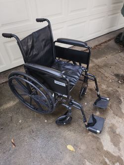 Wheel chair almost new