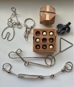 Wooden and metal puzzles brain teasers