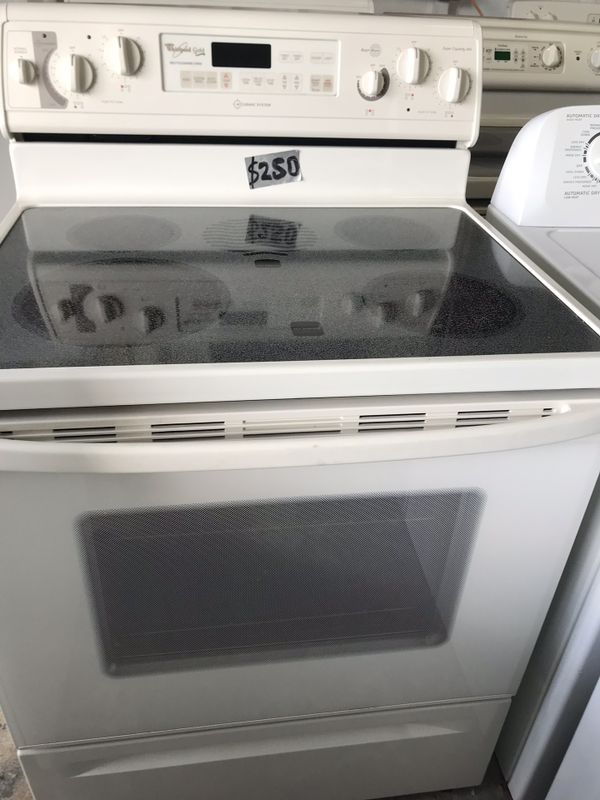 Whirlpool almond color glass top stove in excellent condition plus 6
