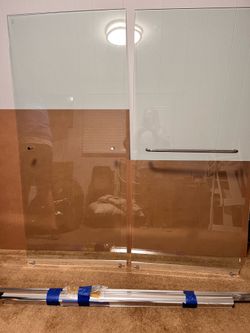 Shower doors for bath tub.