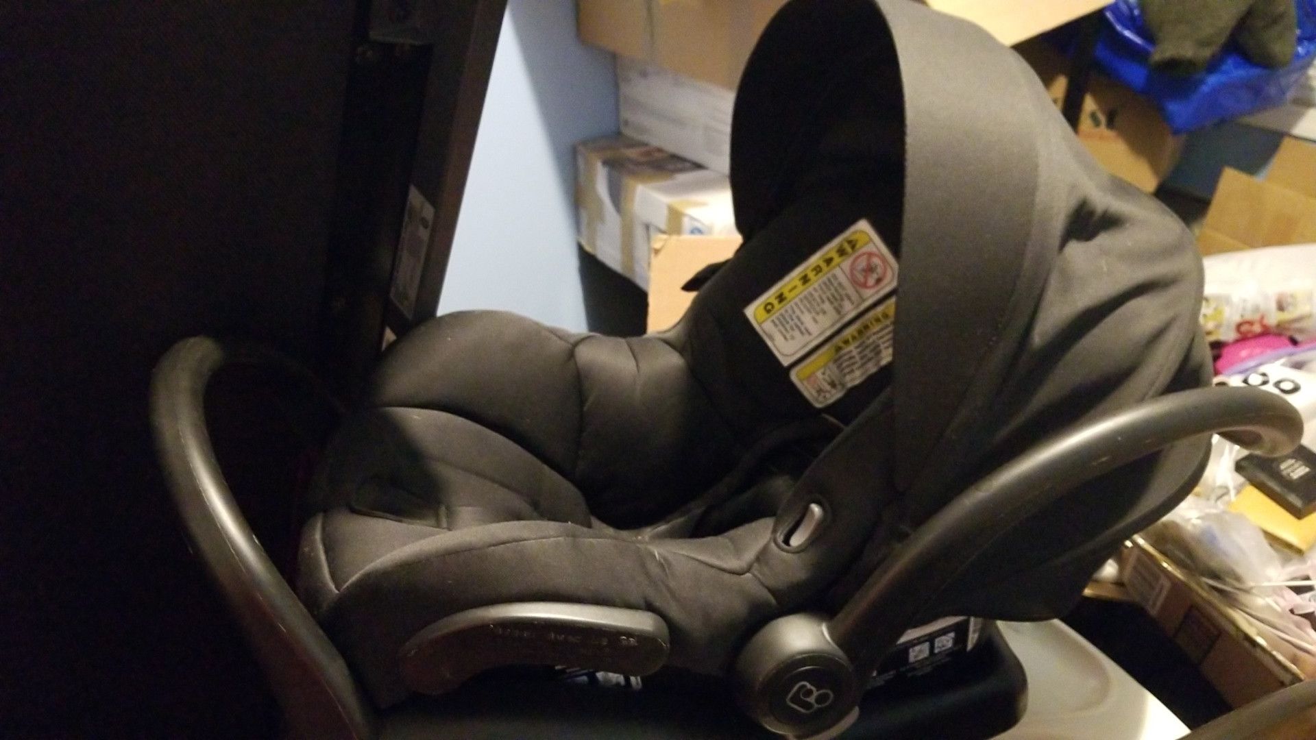 All black MAXI-COSI baby safety car seat