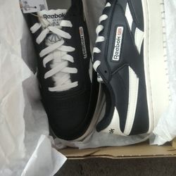 Brand new Never even out of the boxsize ten black and white reebox