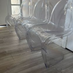 Three Clear Chairs 