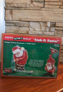 1998 KURT S. ADLER SANTA’S ACTION WORLD SINK IT SANTA GOLF MECHANICAL BX13