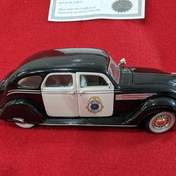 1936 Chrysler Airflow Bedfcrd Falls Police Car Die Cast Model Car With A Certificate Of Authenticity Made In 2003 