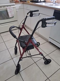 Walker with a seat. Drive Rollator Walker
