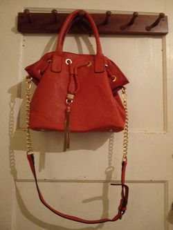 Orange leather purse in good shape for the low