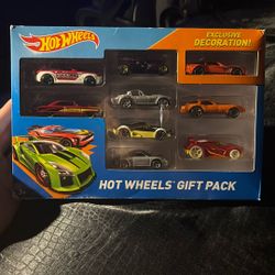 This product is a Hot Wheels 9-car gift set featuring die-cast vehicles in 1:64 scale