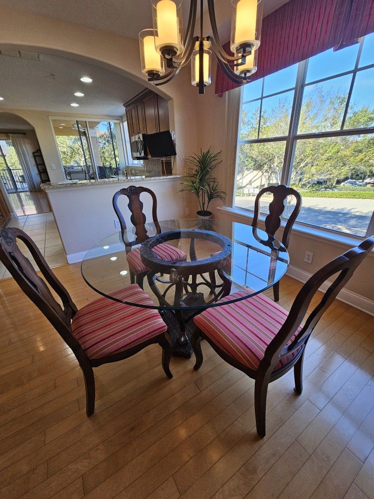 Round Dining room Table 54"glass-top and 4 Fabric Seat Chairs