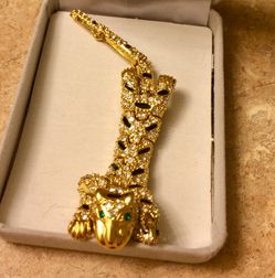 Unique vintage jaguar pendant with stones and gold accent