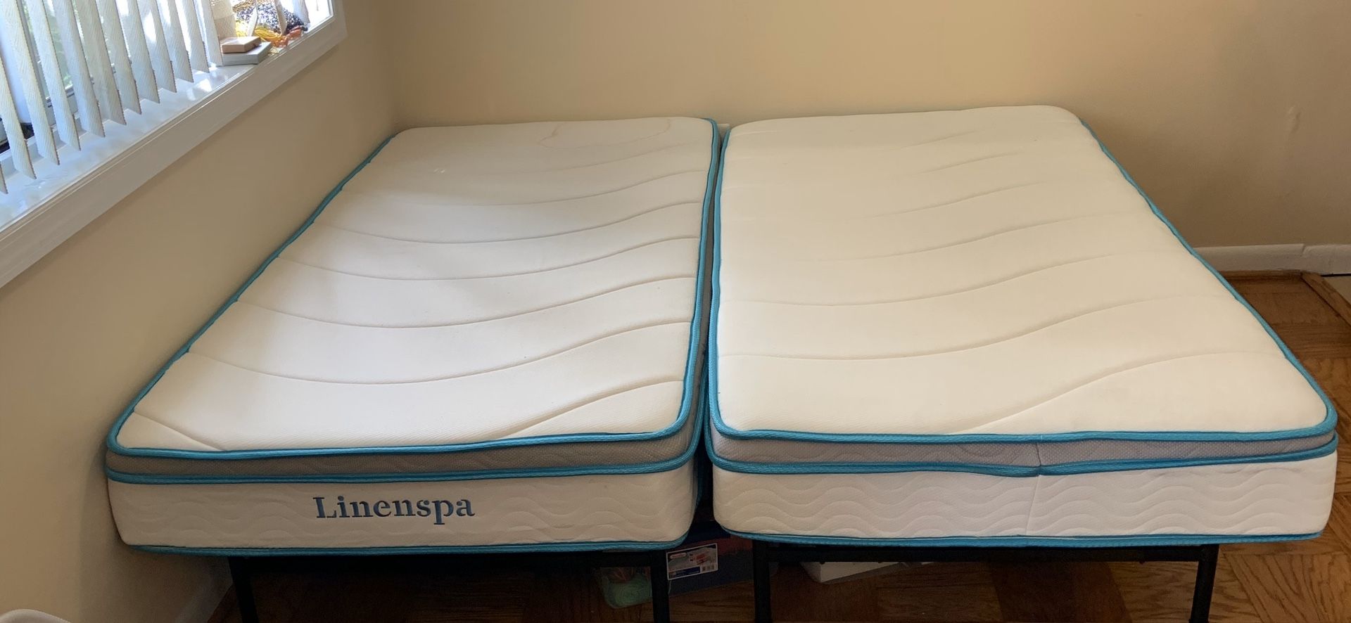 Two Twin XL mattresses or 1 King size mattress