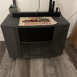 TV Stand  with two sided shelves glass front door swivels back-and-forth