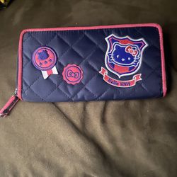 Hello Kitty Long Wallet,https://offerup.com/redirect/?o=Ti5CbHVl,8” X 4” inches