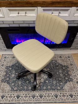 Cream armless office chair