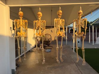 (4) FULL SIZE POSABLE SKELETONS with RED LED EYES