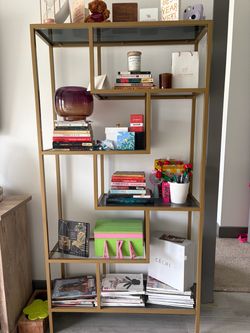 Gold Metal and Glass Bookshelf