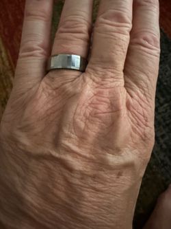 1 silver ring with blue stone & men’s band ring