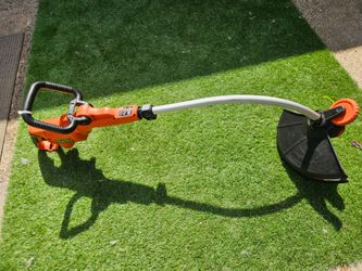 Black and decker electric yard trimmer  great condition