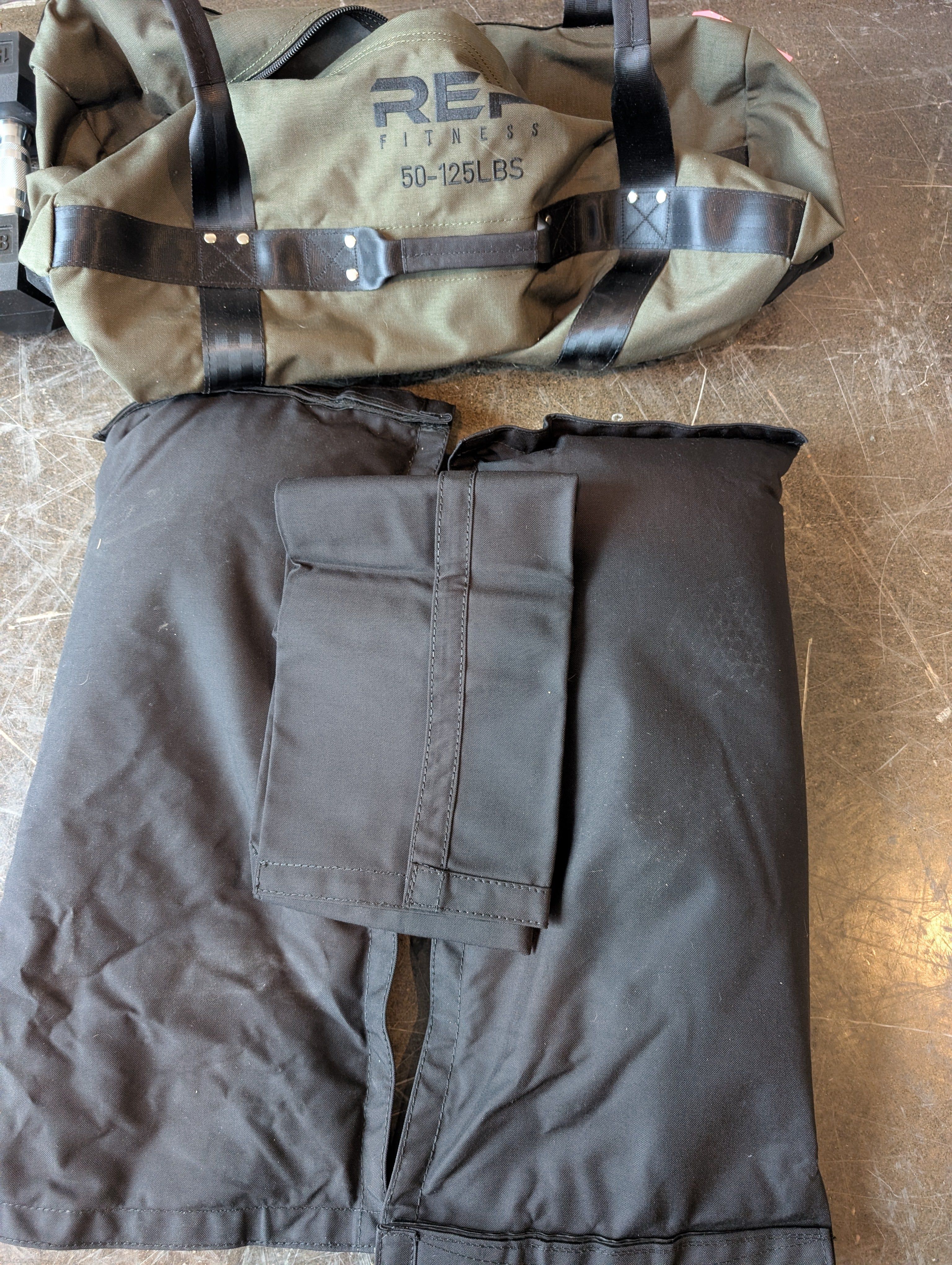 REP FITNESS Durable 50-125LBS Workout Sandbag with Battle Rope