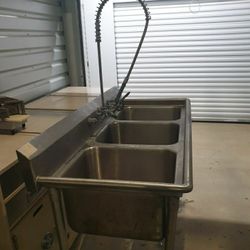62“ three bay sink and and wall mount prerinse unit like new best offer.