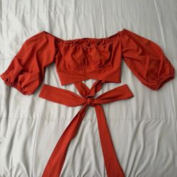 Burnt orange off the shoulder top with tie detail