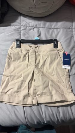 Brand new beige shorts and navy blue school uniforms