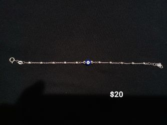 silver lucky eye bracelet /pulsera de ojo de la suerte de plata