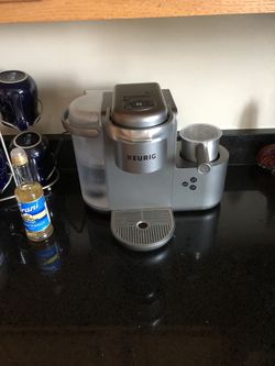 Keurig Latte and Cappuccino maker with coffee pods and flavor