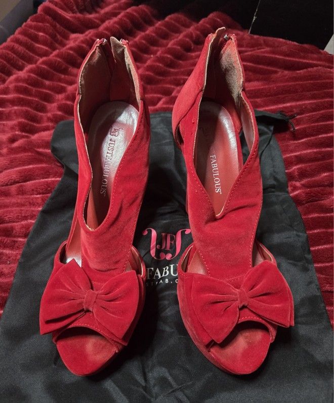 Red Velvet Red Platform HeelsBeautiful red velvet platform heels.
Size 8.5