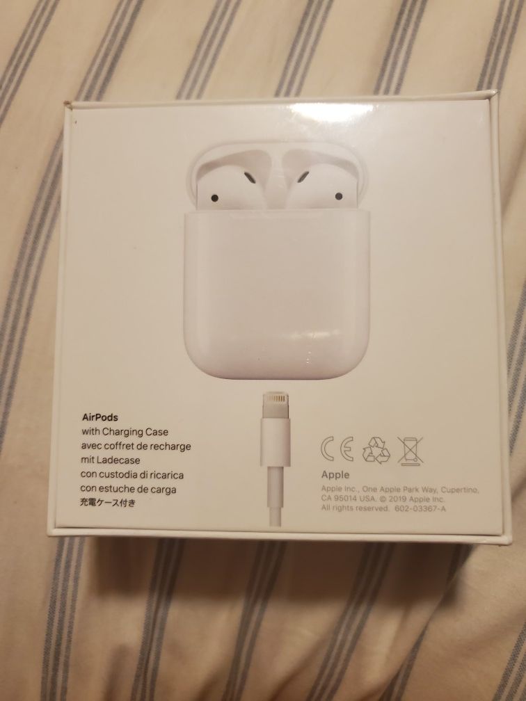 Air pods with charging case new never opened