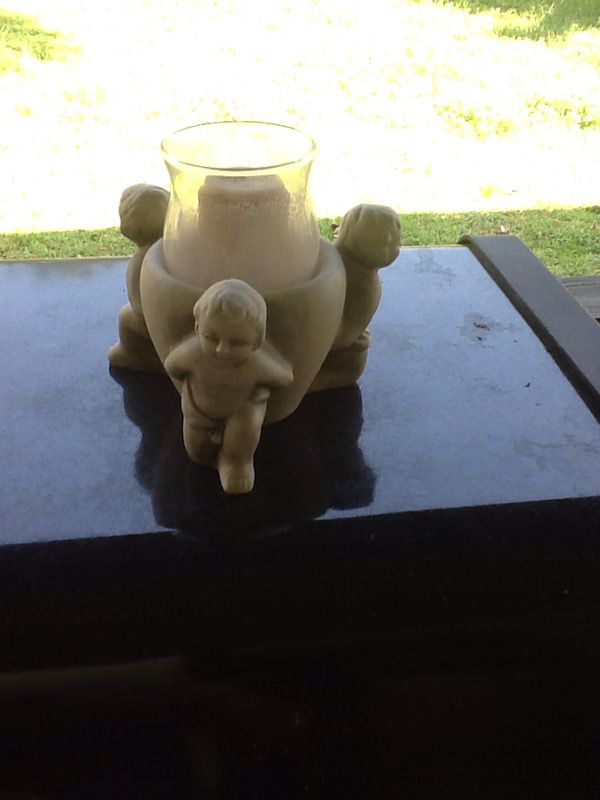 New angel candle holder with new candle