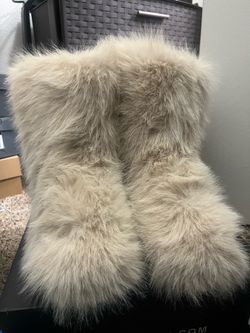White fur boots