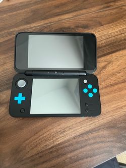 Nintendo 2DS XL with Games and Case