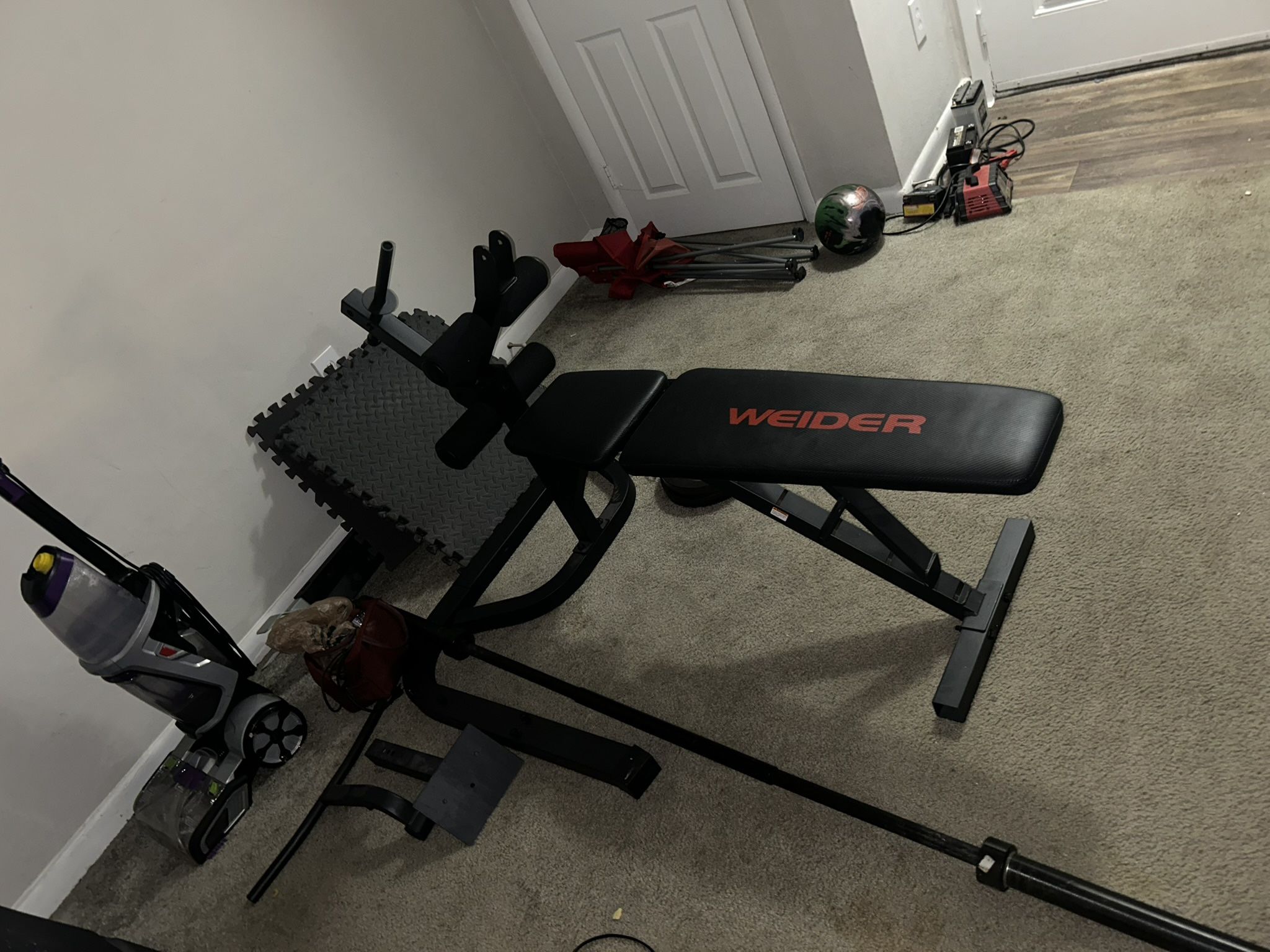 Weight Bench W/ Barbell And Weights 