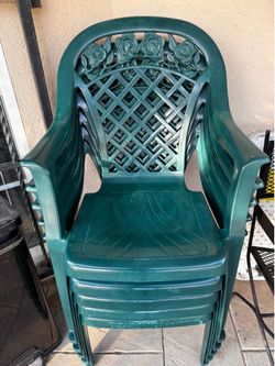 5 green high-back resin patio armchair