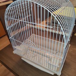 New, Small Bird Cage,Single Door Open,Two Feeders Two Stand Poles. Stand Crate.Never Used.
